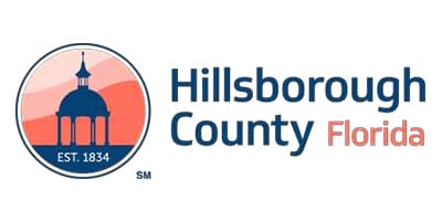 Hillsborough County Public Schools logo with a peach illustration.