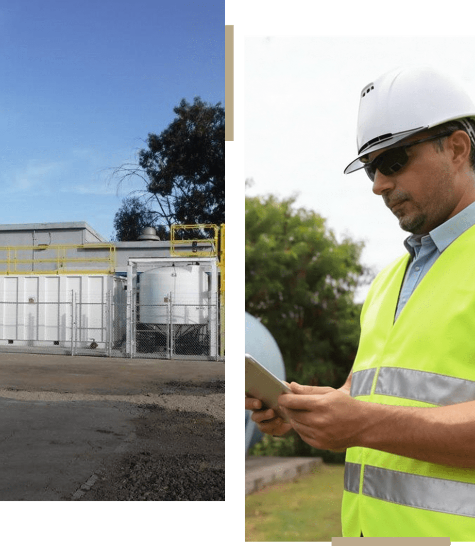 Industrial storage tanks with a worker inspecting documents nearby.