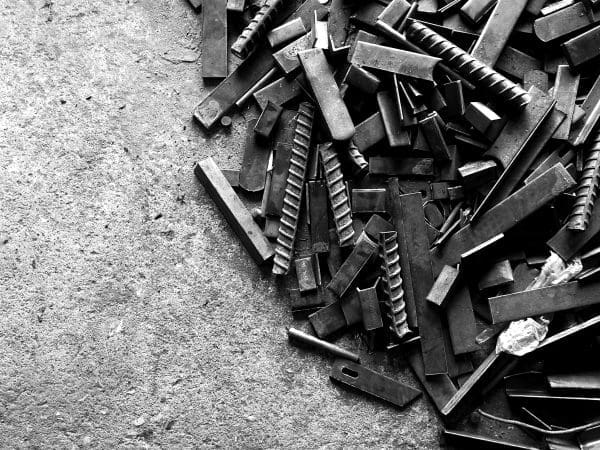A close-up of a green leaf with visible texture and veins.