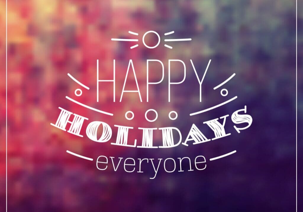 Happy holidays greeting with a colorful blurred background.
