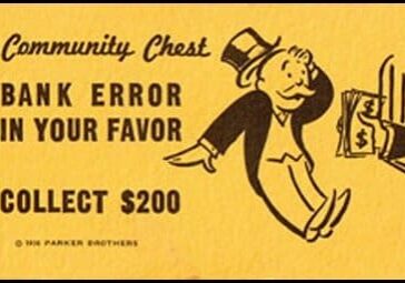 Vintage Monopoly Chance card showing a $200 bank error in your favor.