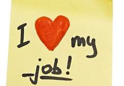 Sticky note with 'I love my job!' message.