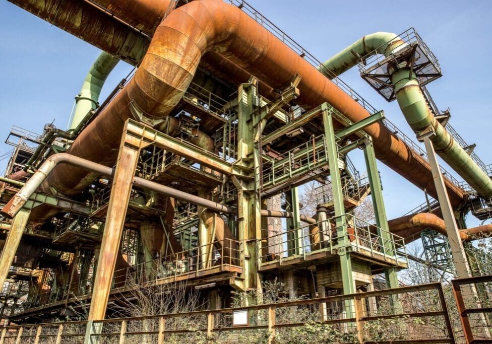 metal-pipes-structures-with-clear-blue-sky-scaled