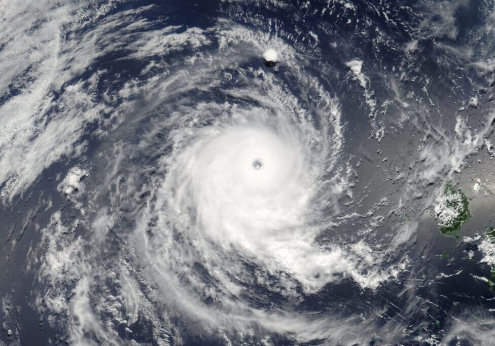 A powerful hurricane with a clear eye over the ocean.